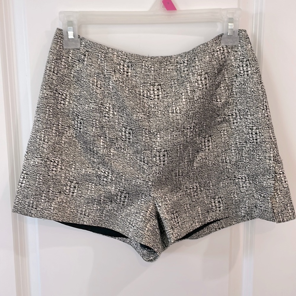 Black, and nude, gold accented high waisted shorts